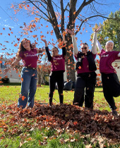 A group volunteering outside