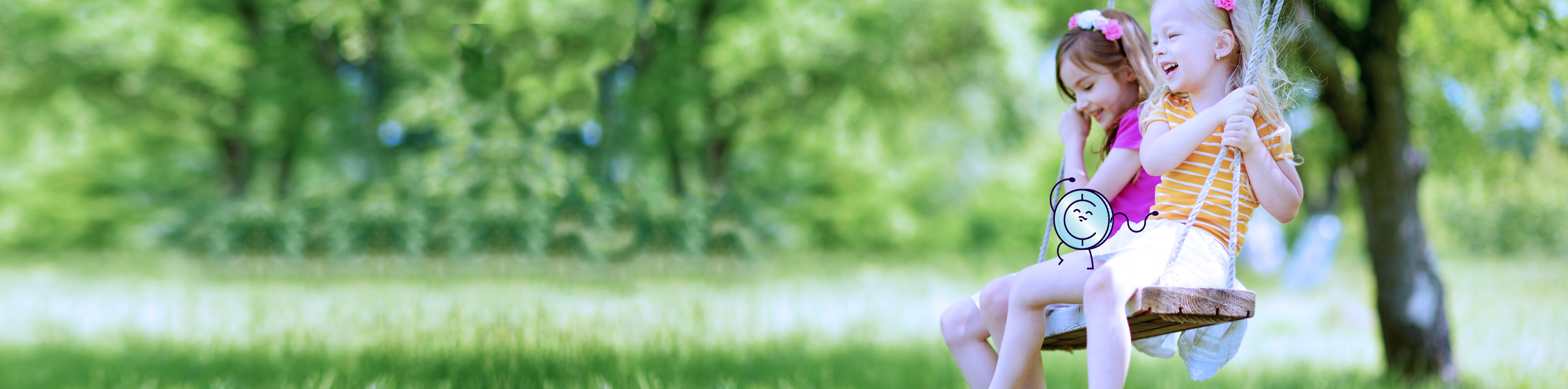 two children outside on a swing